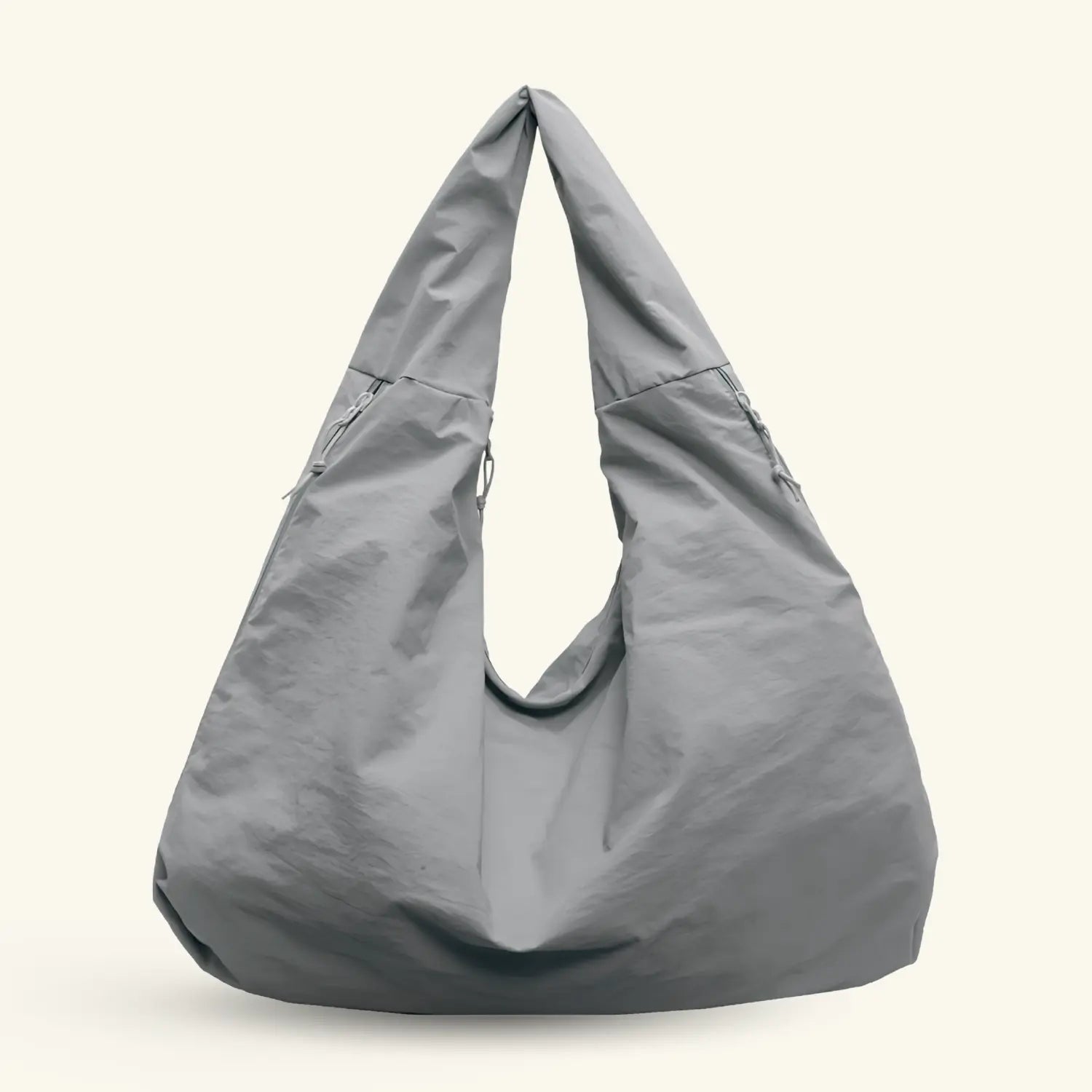 Lumi Tote - WB0165 - Bolsa estilo hobo amplia, ligera y funcional con compartimentos ocultos y textura suave al tacto