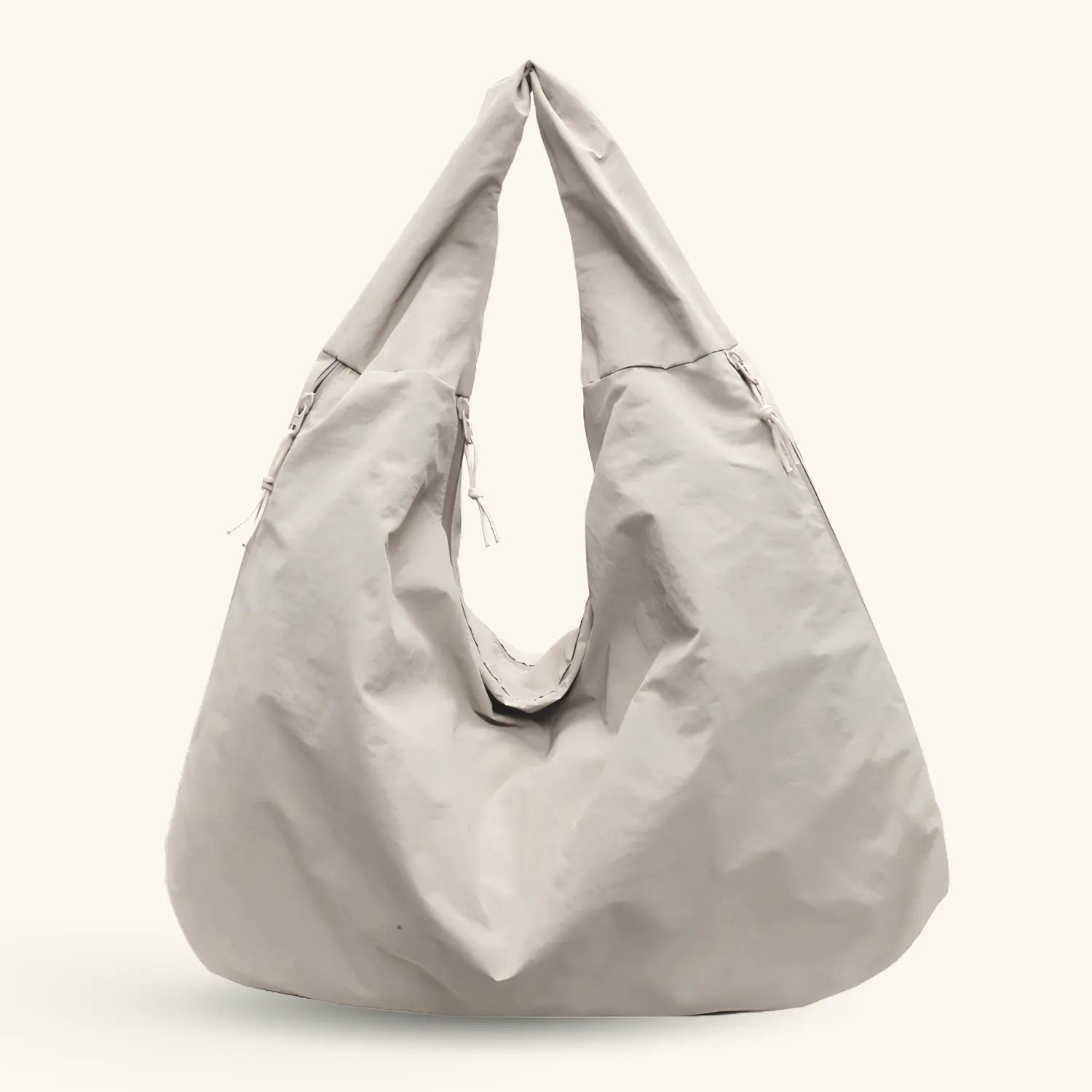 Lumi Tote - WB0165 - Bolsa estilo hobo amplia, ligera y funcional con compartimentos ocultos y textura suave al tacto